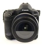 Canon: A Canon EOS 1D Mark II camera body,