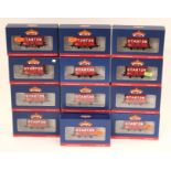 Bachmann: A collection of thirteen boxed 8 Plank Wagons with Coke Rails, 'Stanton',