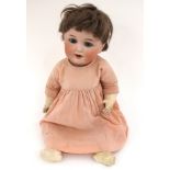 Doll: A German bisque head doll, open and close eyes, open mouth revealing two top teeth,