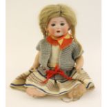 Dolls: A collection of four dolls to comprise: a Bahr & Proschild bisque head doll,