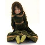 Armand Marseille: A large bisque head doll, in original green velvet dress,