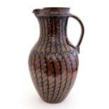 David Lloyd Jones, a large studio pottery jug, herringbone type Tenmoku glaze, seal mark,