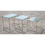 A set of three brass and glass occasional tables, circa 1970s,