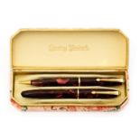 Conway Stewart Dinkie fountain pen and pencil set, 550 and 25, red marbled,