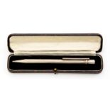 Cartier, Must de Cartier ballpoint pen, silver plated, with tricolour ring and red enamelled clip,