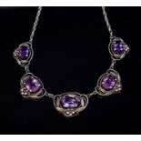 An Arts and Crafts silver and amethyst necklace, in the style of Bernard Instone,