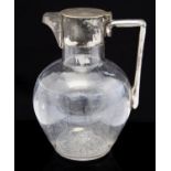 After Christopher Dresser, a silver plated and glass claret jug,