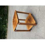 An Art Deco walnut occasional table, quarter veneered with square section bentwood legs,