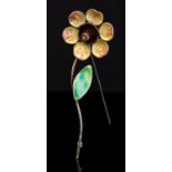 A Modernist silver and enamelled flower brooch, the petals in yellow and pink enamel,