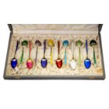 David Andersen, a boxed set of twelve harlequin enamelled silver gilt spoons, Secessionist style,