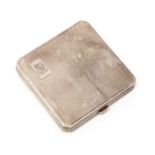 An Art Deco silver compact with integrated Coty lipstick, engine turned, Bravingtons,