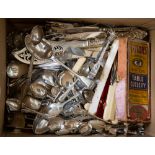 A box of assorted cutlery including spoons, knives, forks, etc,