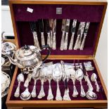 A Viners silver plated Queens pattern canteen of cutlery including cake slice;