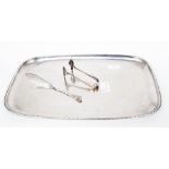 A large 1920s silver plate oblong mottled drinks tray together with a butter knife and a pair of