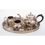 A three piece silver plated tea service;