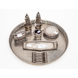A collection of silver plate including a tray, cruet set,