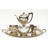 A silver tea service comprising teapot, hot water jug, milk and sugar, total weight approx 47.