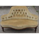 A Victorian serpentine upholstered settee,