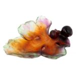 Daum, a pate de verre glass dish, moulded in the form of a fruiting fig leaf, green and red amber,