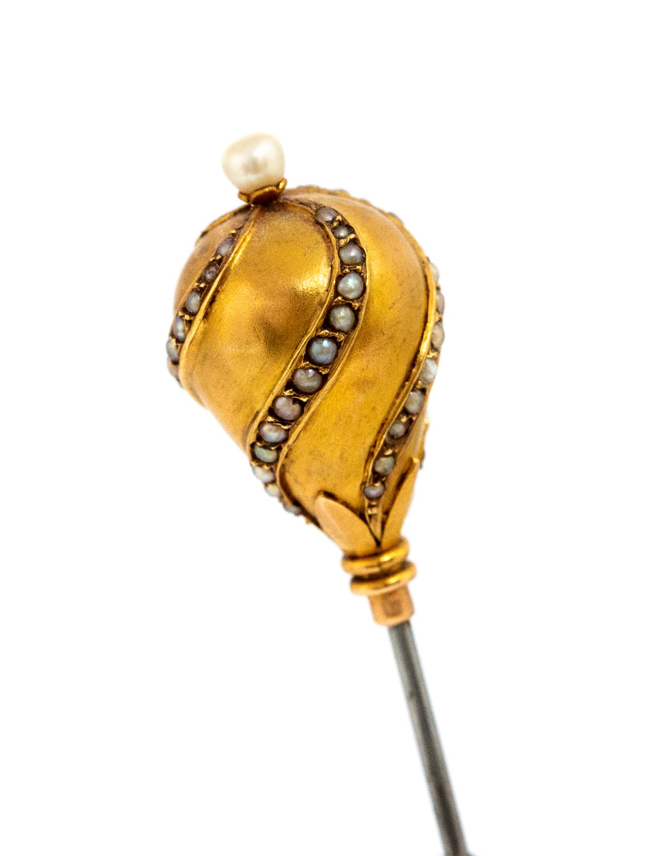 A 19th century yellow metal and pearl hat pin,