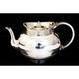 A Victorian silver teapot, of circular form with beaded rim, gadroon base, maker George Fox, London,