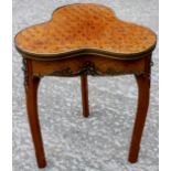 A 19th Century parquetry veneered occasional table, the top of trefoil design with brass bound edge,