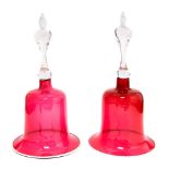 A pair of late Victorian ruby glass decorative bells (2)