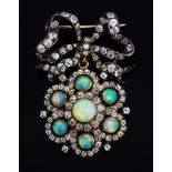 An Edwardian silver and gold, opal and diamond brooch,