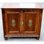 A 19th Century figured walnut side cabinet of Empire design, later adapted internally,