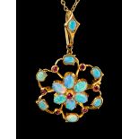An Edwardian opal and ruby gold brooch/ pendant, set in 15ct gold,