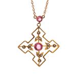 An Edwardian 9ct gold pendant, angular open form, a round pink paste stone,