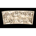 A Chinese Qing dynasty relief carved ivory panel, early 19th Century, of gentle curved shape,