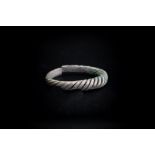 Viking (9th-12th century AD) Silver ring composed of wires twisted together;