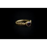 Medieval (13th -15th century AD) Gold ring with plain flat band widening at the shoulder and