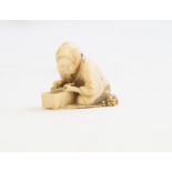 A Japanese ivory netsuke, Meiji period, 1868-1912, kneeling woman with chopsticks, signed,