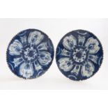 A pair of dark blue glaze Delft plates,