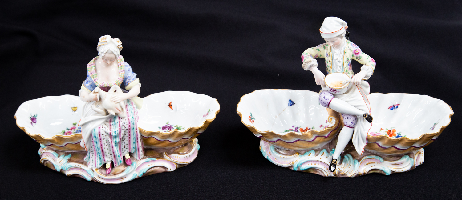 A pair of large Meissen double salts or bowls, modelled with cooks between shells,