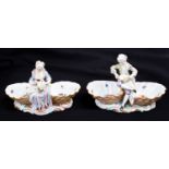 A pair of large Meissen double salts or bowls, modelled with cooks between shells,