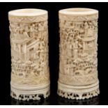 A pair of 19th Century Chinese ivory brush pots,