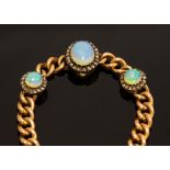 An opal and diamond 15ct gold bracelet, comprising three graduated white opals set to the front,