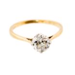 A diamond solitaire 18ct yellow gold ring, the round old cut diamond approx 1.