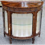 A pair of early 20th Century Neo-Classical style mahogany demilune display cabinets,