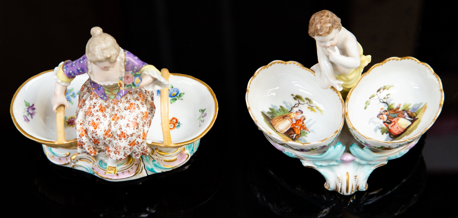 A Berlin porcelain double salt cellar, modelled with a central putto between two floral painted, - Image 2 of 2