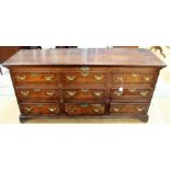 A George III oak Lancashire mule chest, decorated with mahogany cross-banding,