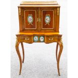 A late 19th Century Louis XVI style kingwood side cabinet, the upper section with a galleried tray,