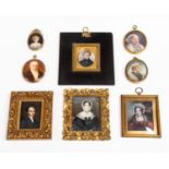 A collection of eight assorted portrait miniatures of Victorians, spanning generations,