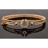 A Victorian 15ct gold and diamond hinged bangle,