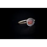 Roman (1st to 4th Century) Gold ring with an orange stone intaglio engraved with Pegasus.