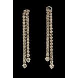 A pair of diamond 18ct white gold double tassel drop earrings,