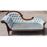 A Victorian mahogany chaise longue, shaped back rail, deep buttoned upholstered back,